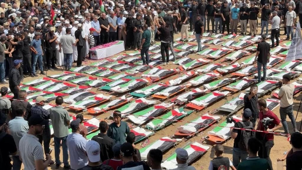 Mass funeral in Gaza for 112 Palestinians killed in 2023 Israeli strike