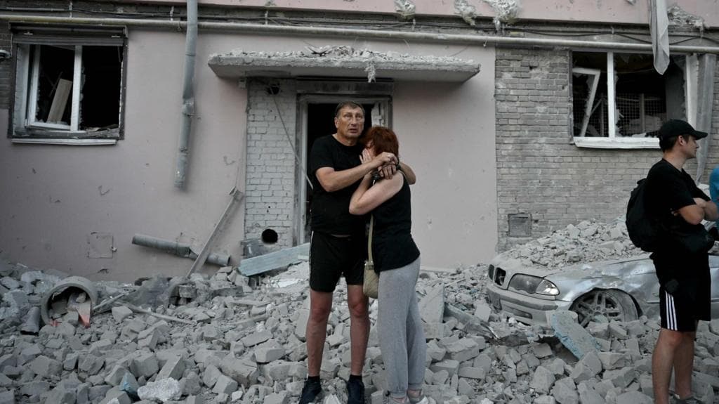 At least 13 killed in large-scale Russian missile and drone strikes on Kyiv