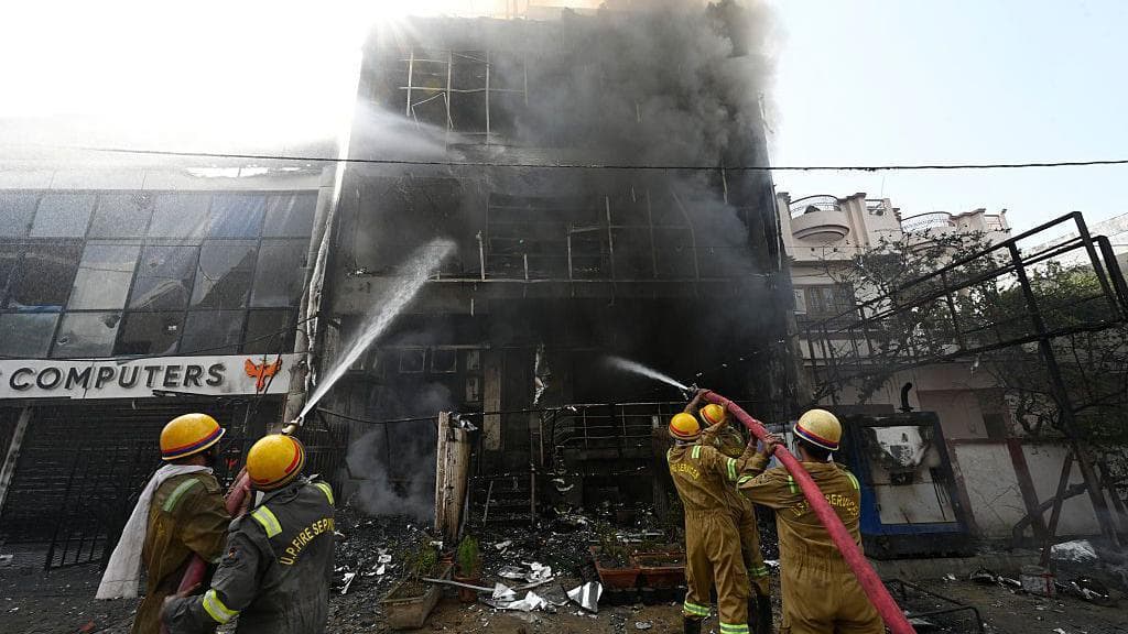 Inquiry ordered after building fire kills 15 in north India city