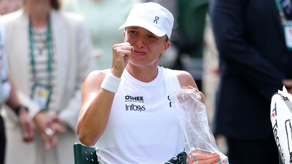 'A tough couple of weeks' - tearful Swiatek overcomes first-round scare