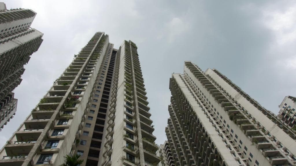 These seaside apartments were a ghost city - then police say scammers moved in