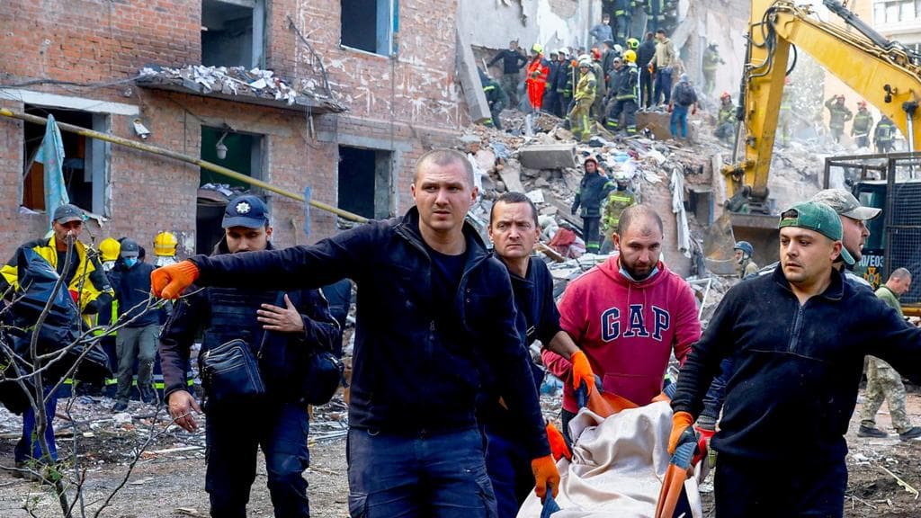 Children killed while they slept as Russian missile kills 19 in block of flats
