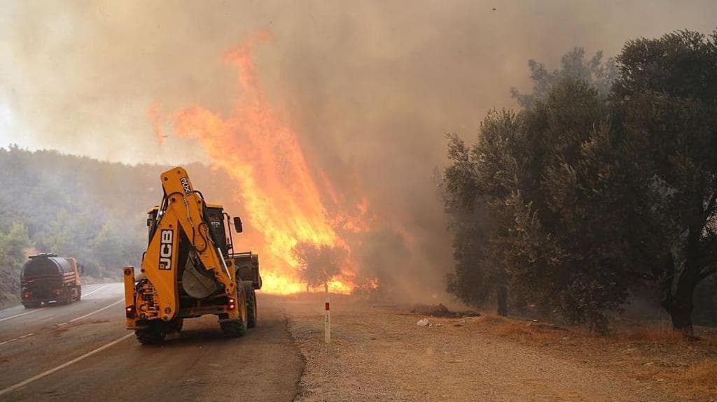 Two firefighters die in Crete as wildfires threaten parts of Southern Europe