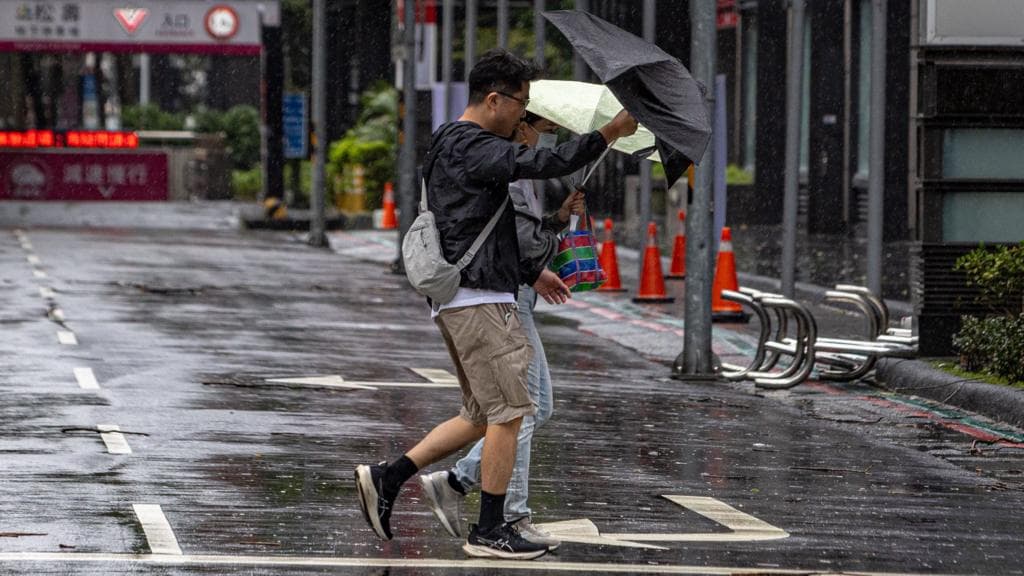 Hundreds of flights cancelled as Typhoon Champi shuts Taiwan