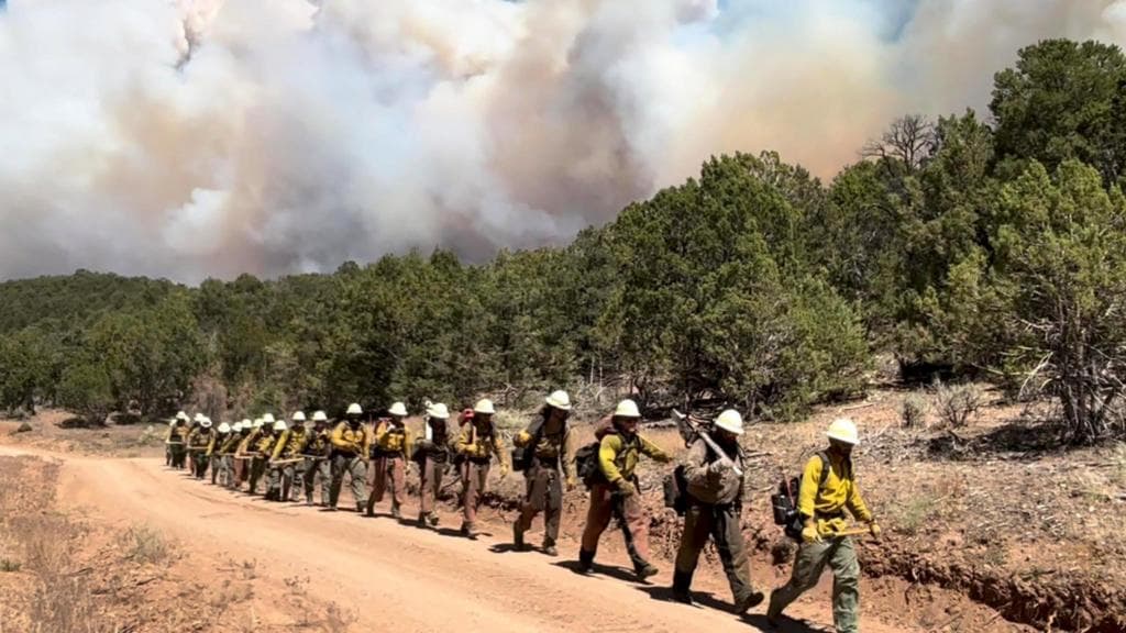 Three firefighters die battling huge wildfires on Colorado-Utah border