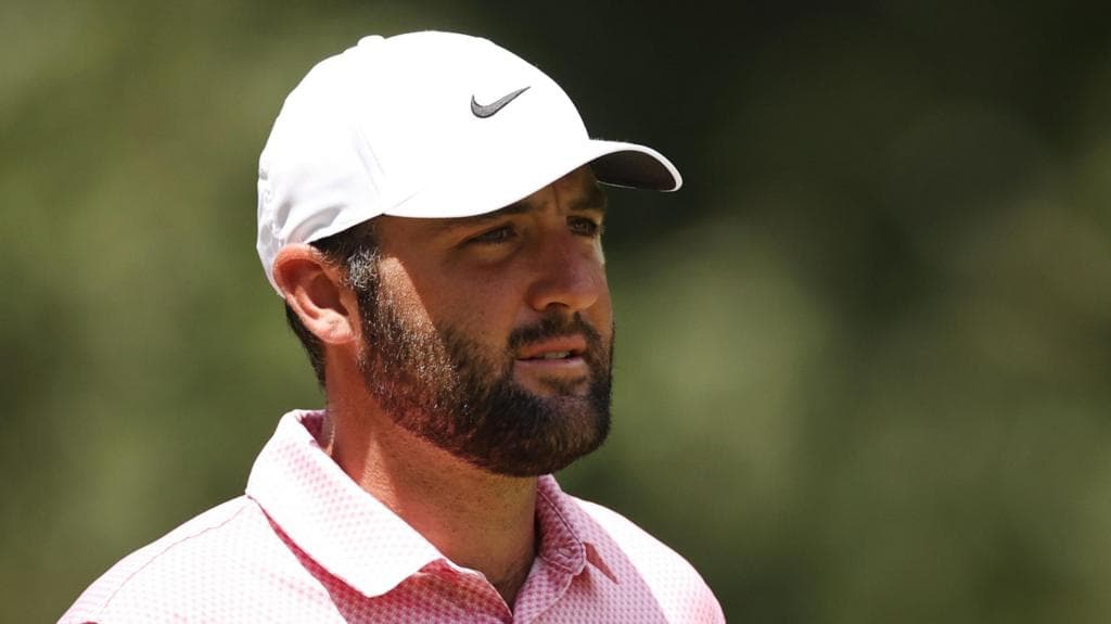 Scheffler equals course record to lead first play-off event