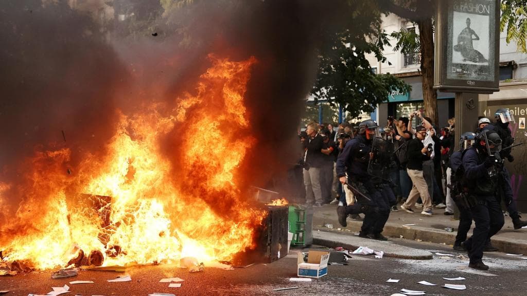 France halts use of stun grenades after boy's hand blown off in student protests