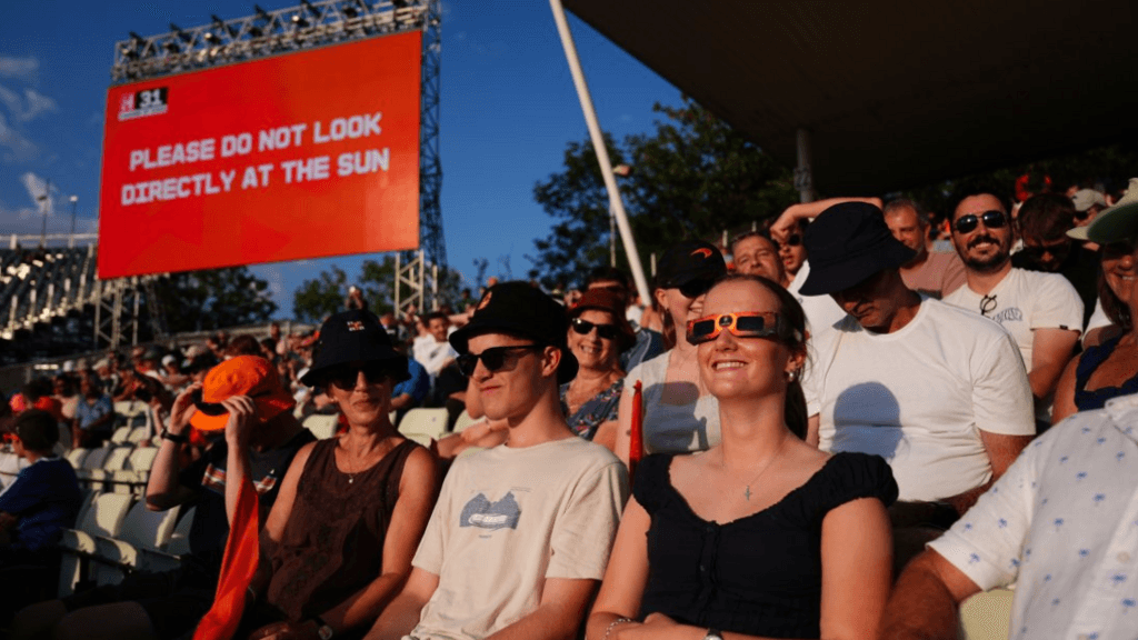 Solar eclipse distracts from sporting events - in pictures
