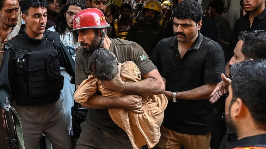 At least 33 pupils and teacher killed after school roof collapses in Pakistan