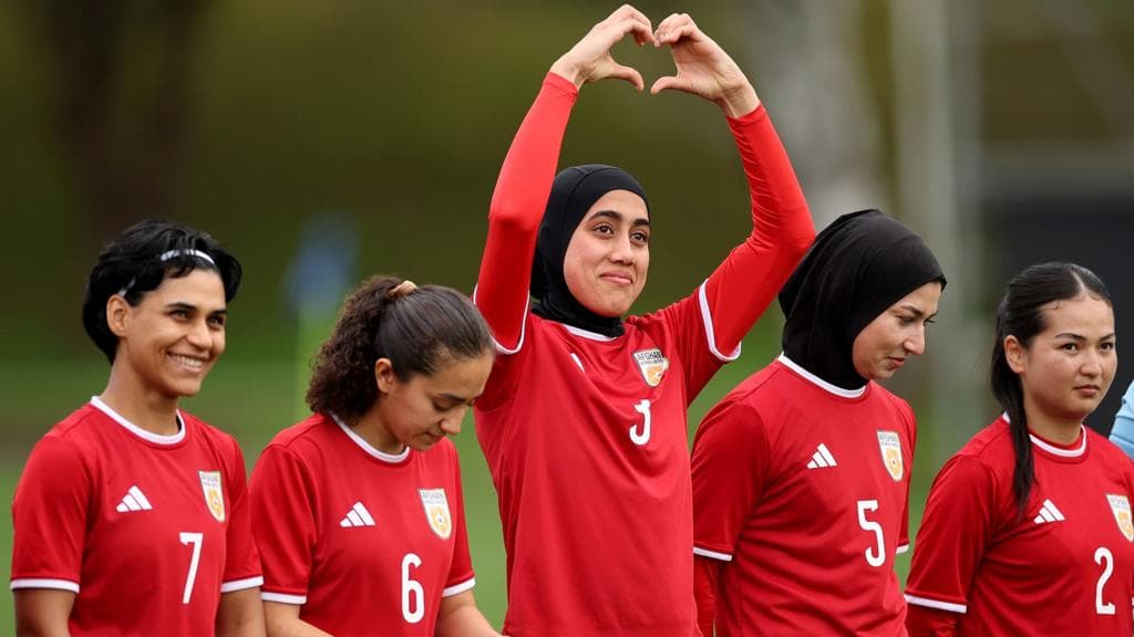 Banned from football at home, Afghan women's team reunite 8,000 miles away