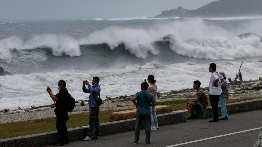 East Asia braces for destructive typhoon as landslides kill 15 in Philippines