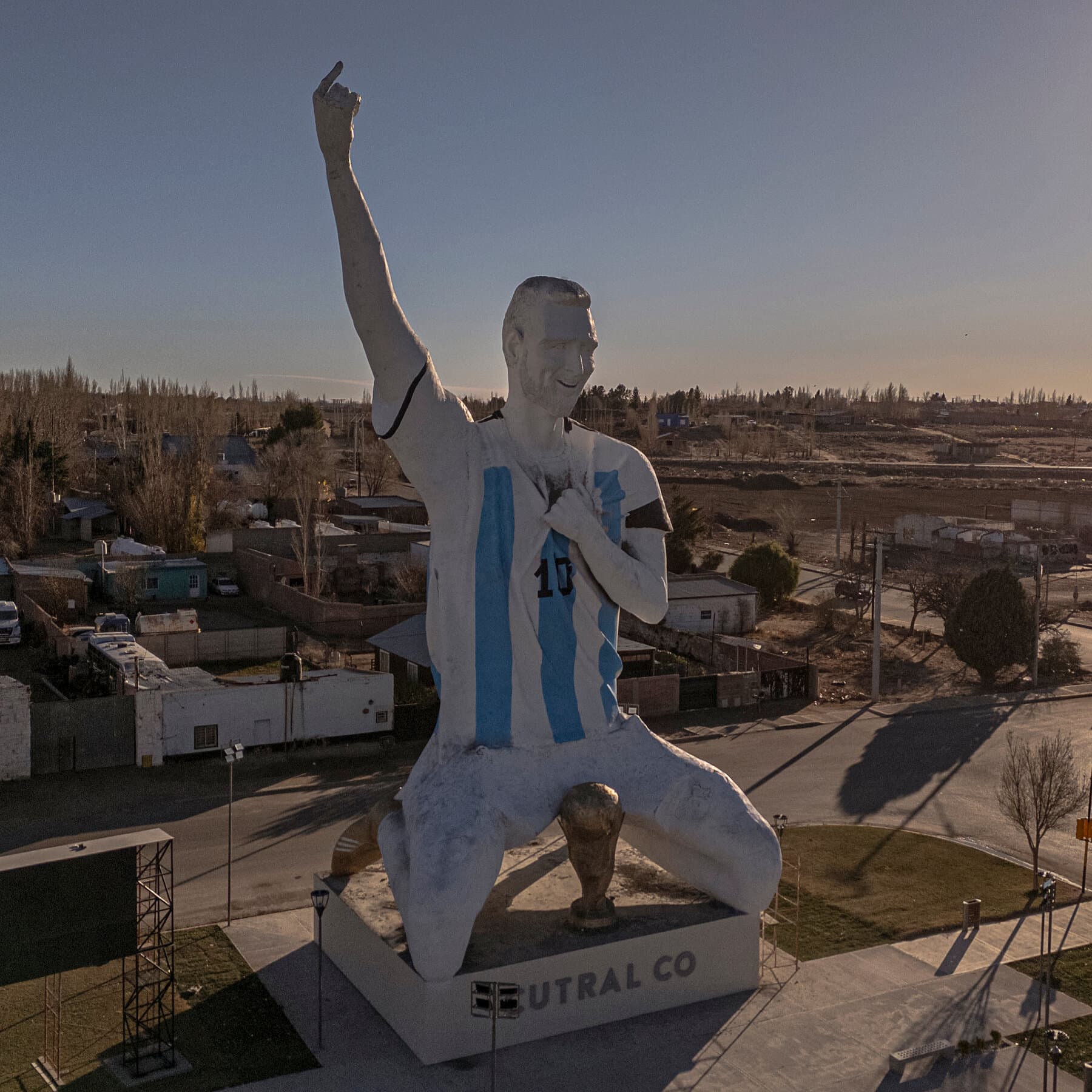 A Sculptor Rushes to Finish a Lionel Messi Statue During the World Cup