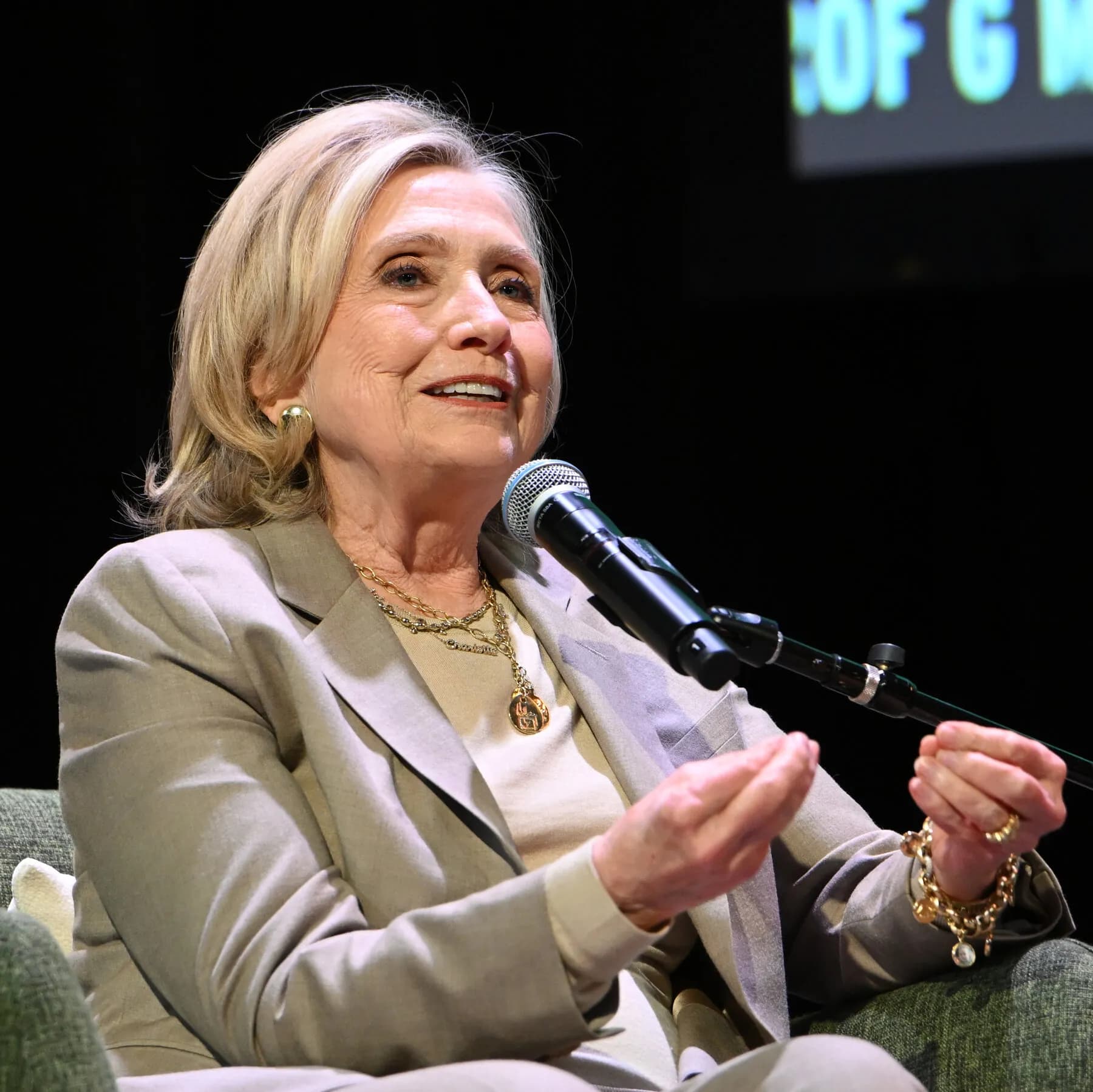 Hillary Clinton Steps to the Podcast Mic as Midterms Approach